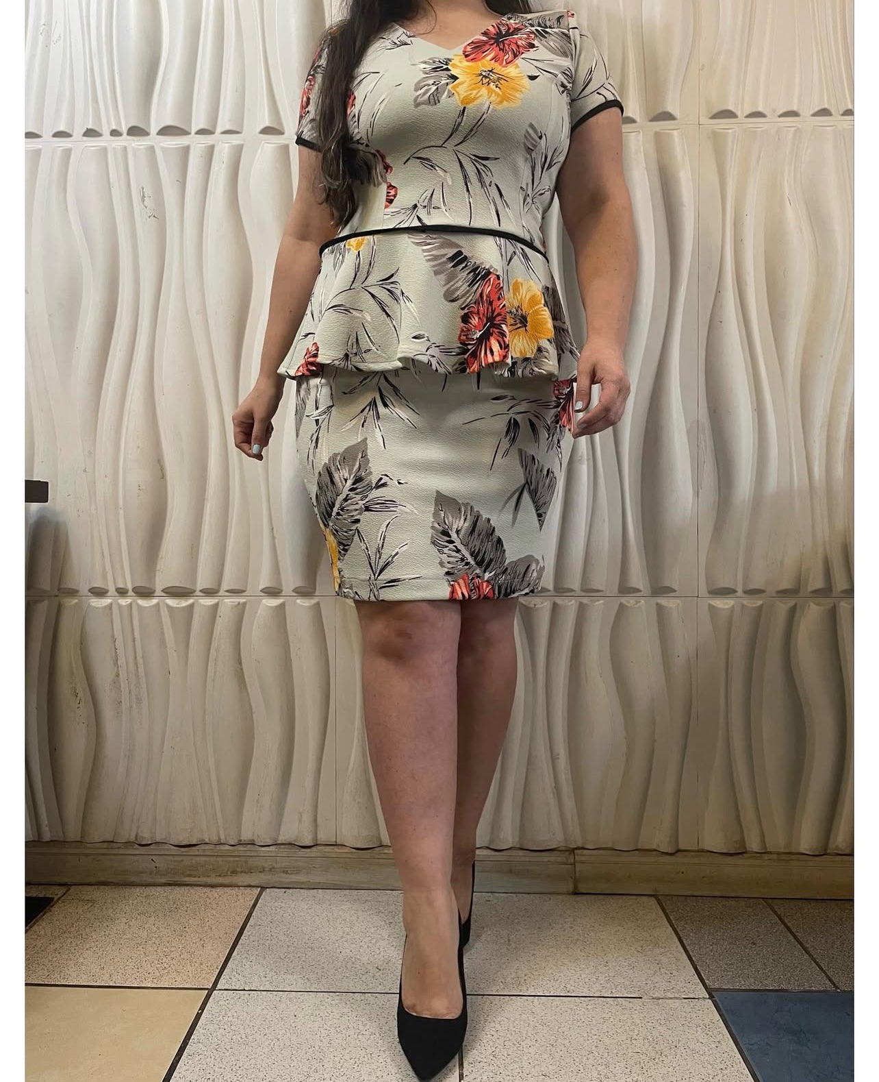 Outfit peplum floreado